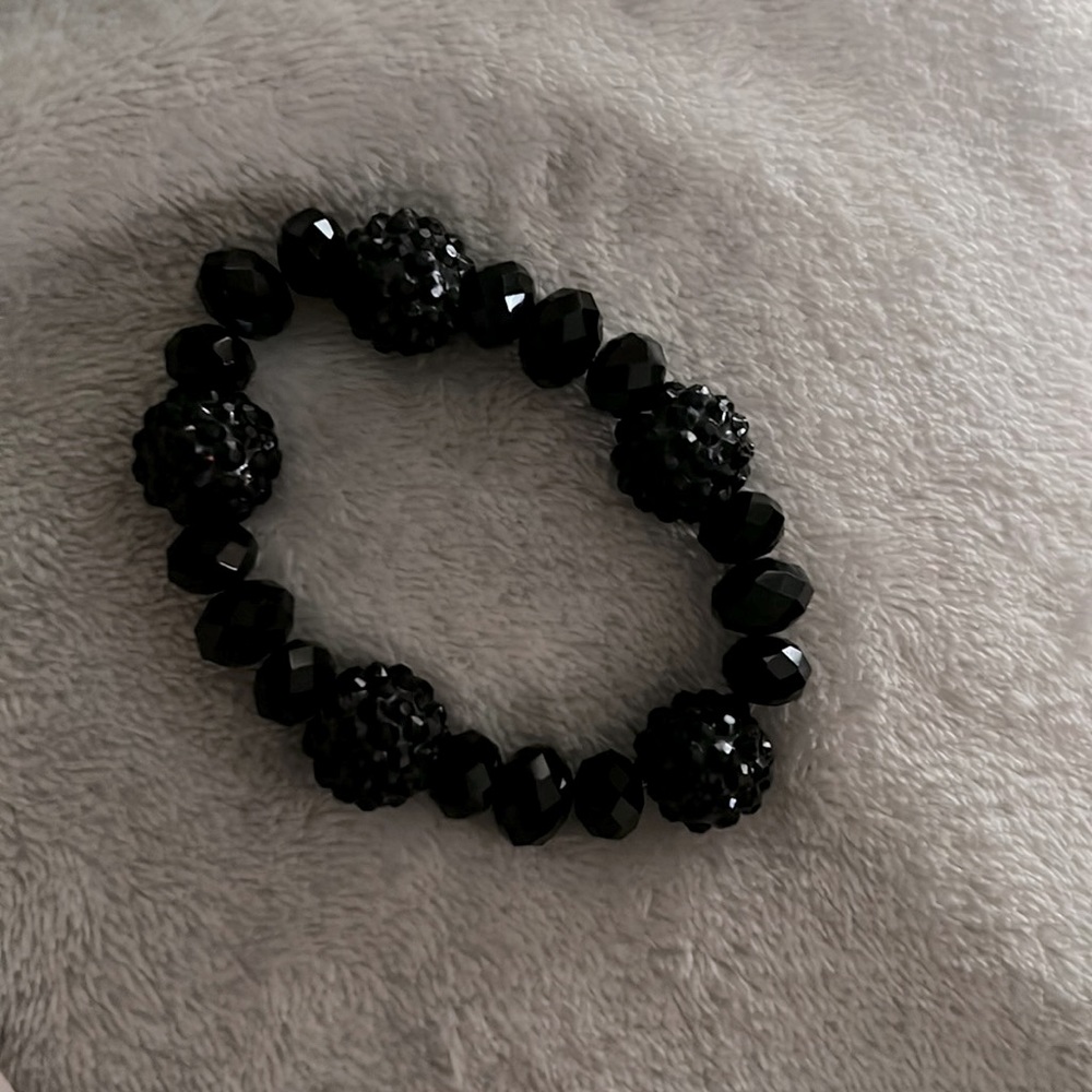 Heavy black crystal bracelet.